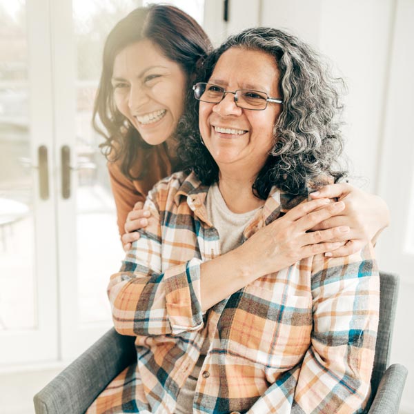 mother and daughter smiling together