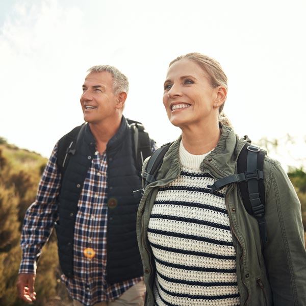 middle aged couple on hike